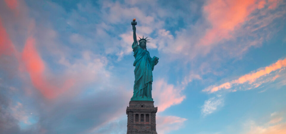 Statue of Liberty in the background of skyscrapers in Manhattan. New York, USA