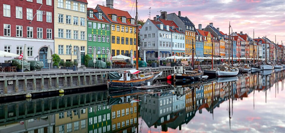 The facades of the famous colorful houses along the Nyhavn canal. Copenhagen. Denmark.