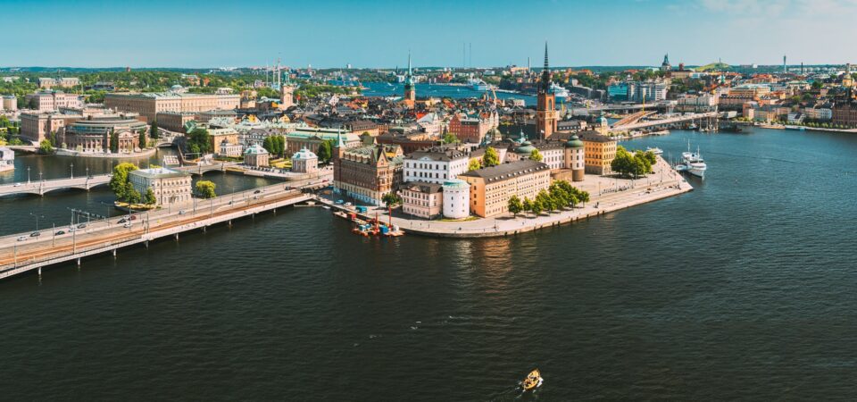 Stockholm, Sweden. Scenic View Of Stockholm Skyline At Sunny Summer Day. Famous Popular Destination Scenic Place. Riddarholm Church In Panorama Panoramic View. Summertime